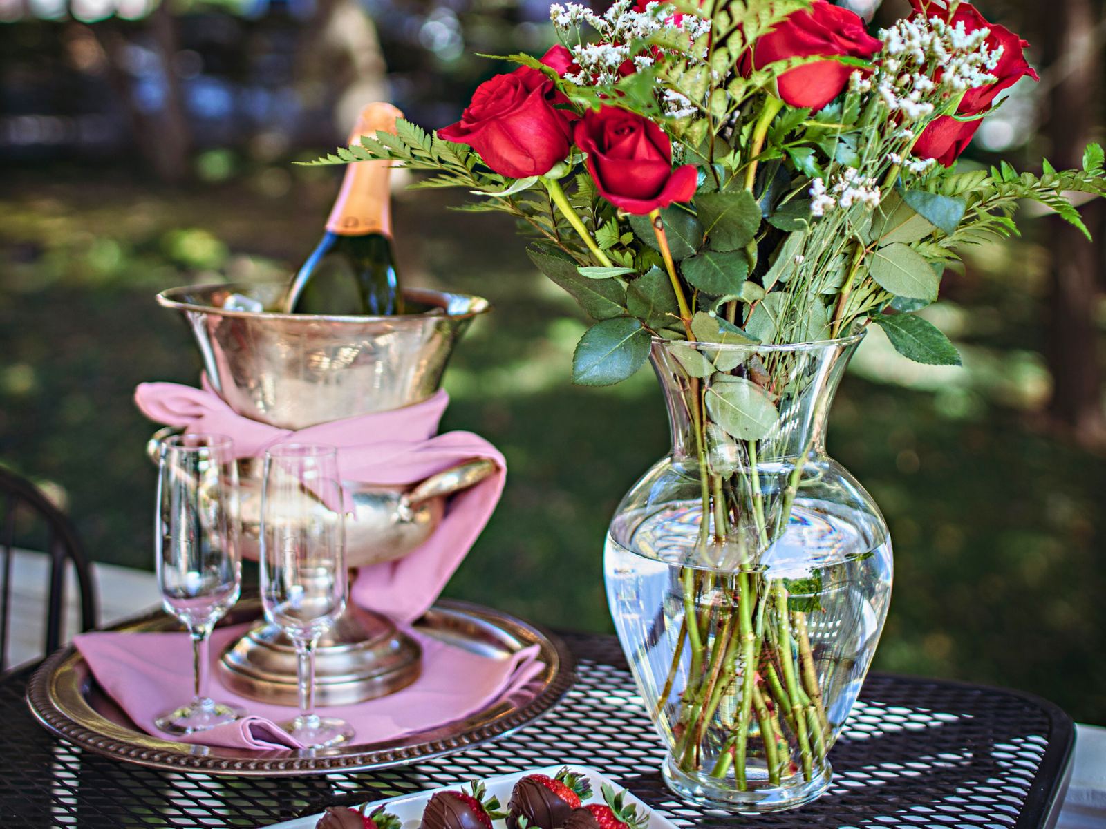 Champagne and roses arranged for a romantic stay at Cedar Crest Inn
